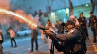 Бразильская полиция применила слезоточивый газ против протестующих против визита понтифика
