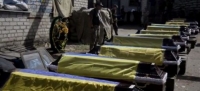 На Украине мошенники предлагают воскресить солдат, погибших в карательной операции