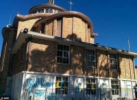 Сидней: униатскую церковь разрисовали сине-желтыми свастиками