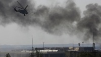 Киевские нацисты сожгли в аэропорту Донецка православных крестоходцев