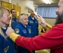 Иностранные космонавты перед вылетом на Байконуре берут благословение у православного священника